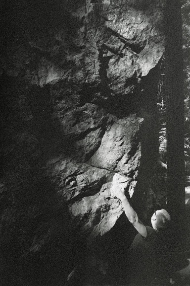 Image of a person bouldering